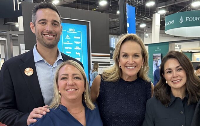 From left to right: Nate Hollensteiner, Mary Ann Moramarco, Jane Mower, and Kayla Thuston stand together at the 2025 IMEX Trade Show.